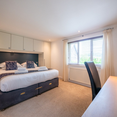Master bedroom with king emporer bed