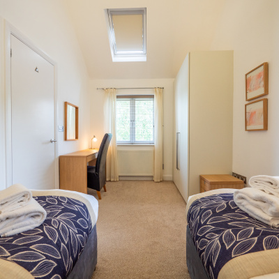 Twin bedroom with desk