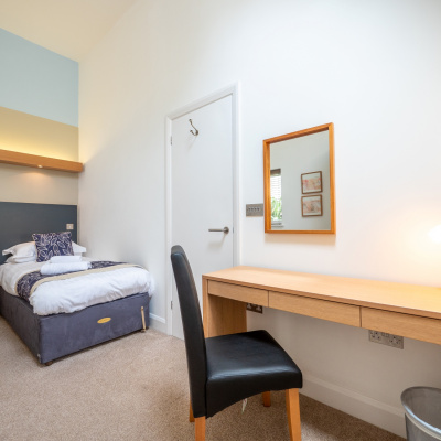 Twin bedroom with desk