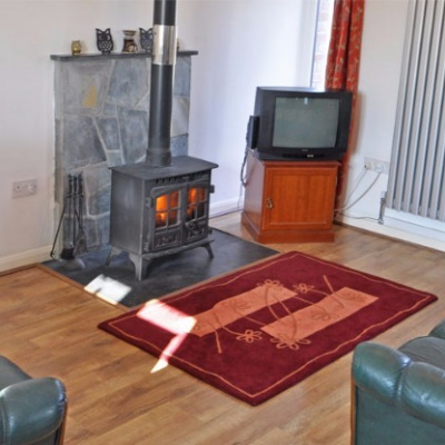 Sitting room with log fire