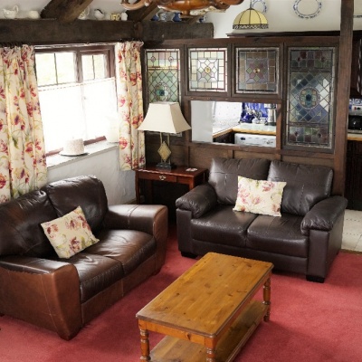 Cosy corner, two leather sofas