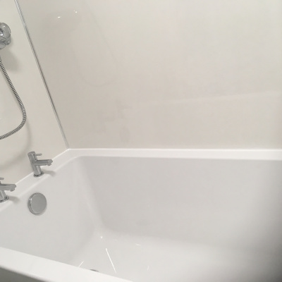 Brand new extra bathroom with bath and overhead shower