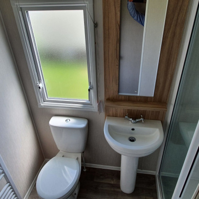 Double sized shower room, WC and wash hand basin