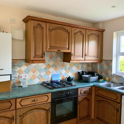 kitchen with full size fridge freezer,oven,hob and washing machine