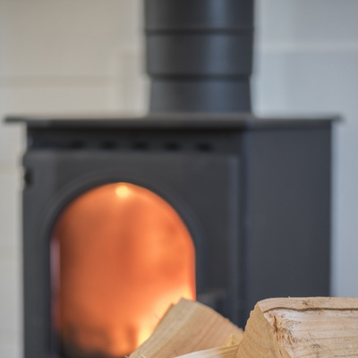 Toasty log burner with complimentary basket of wood on arrival