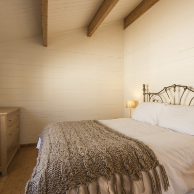 Spacious master bedroom with king size bed