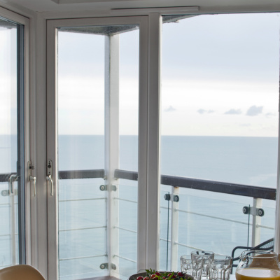 The dining room opens onto the balcony