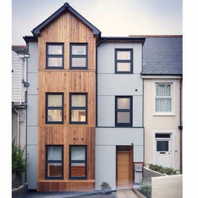 Cedar-clad front of the house