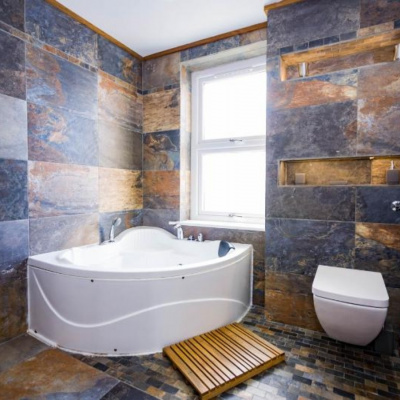 1st floor wet floor bathroom with bath and rainforest shower
