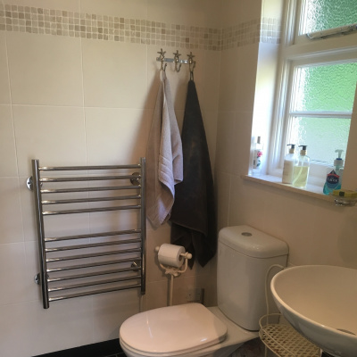 Wet room with power shower and underfloor heating