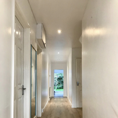 The hallway runs through the centre of the property