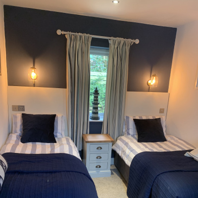 Bedroom 3 with twin beds and luxury bedding from The White CompanyTwin Room