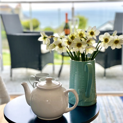 Sit and enjoy afternoon tea whilst listening to the waves