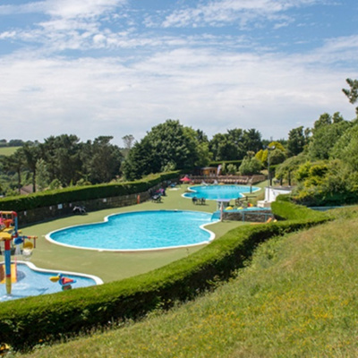 Heated outdoor pools on site, one with slide